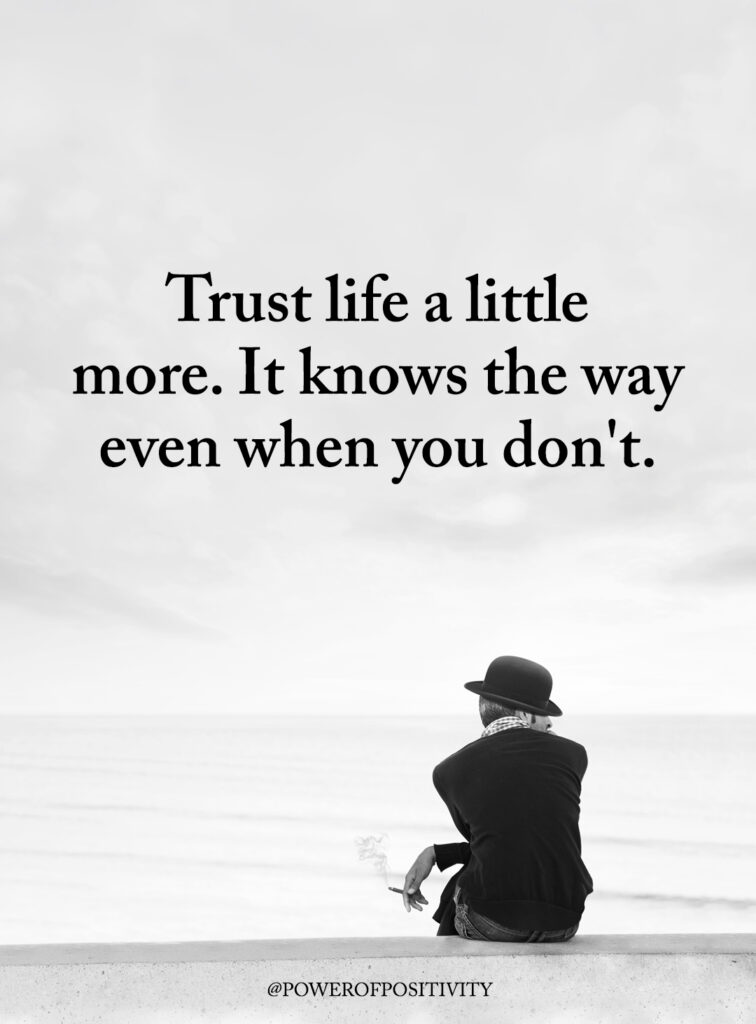 Person sitting by the sea with a quote about trusting life and finding direction even without clarity